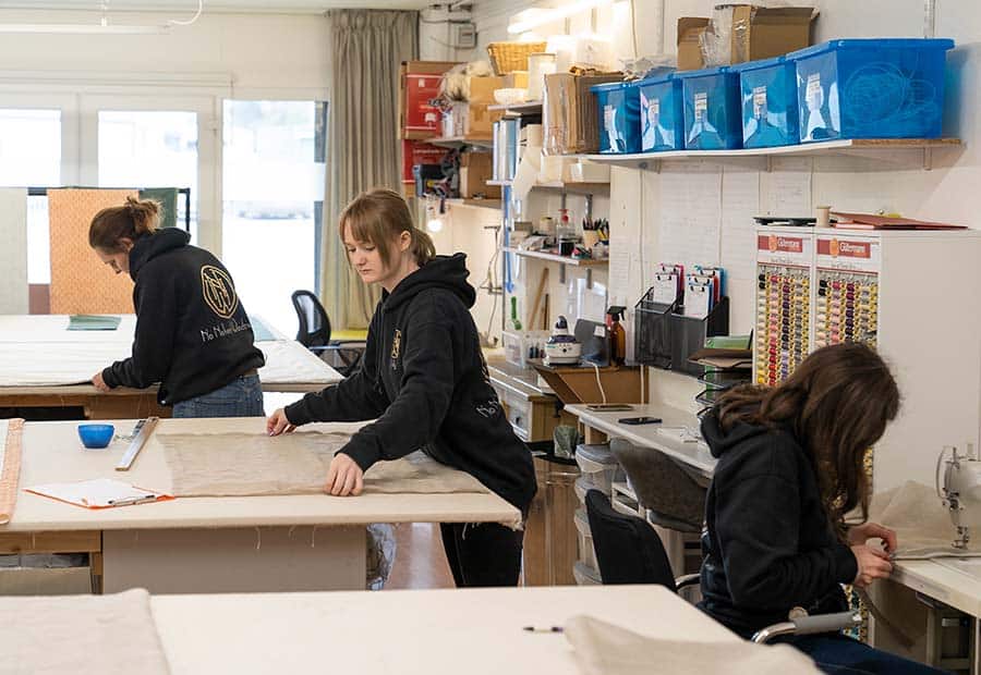 No Naked Windows curtain and soft furnishings workroom with seamstresses at work