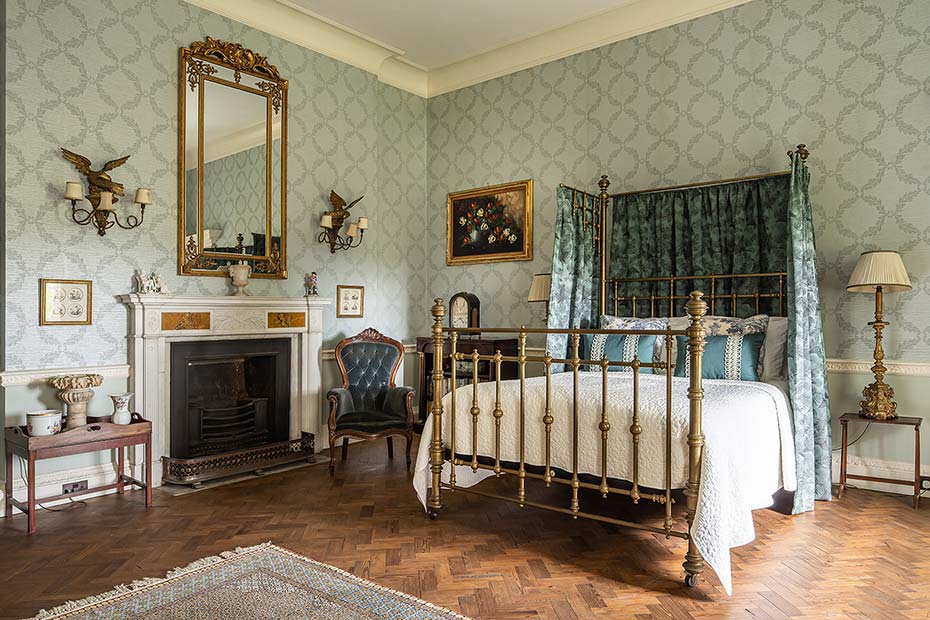 brass bed with half tester bed dressing