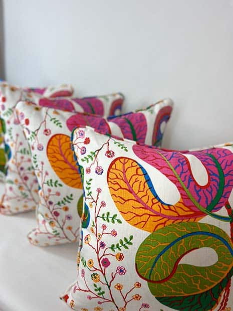 bright modern floral design scatter cushions with piped edges