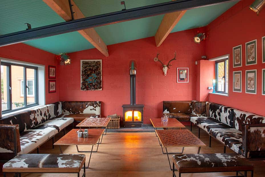 made to measure bespoke cowhide covered banquettes at kimbers coffee shop in somerset