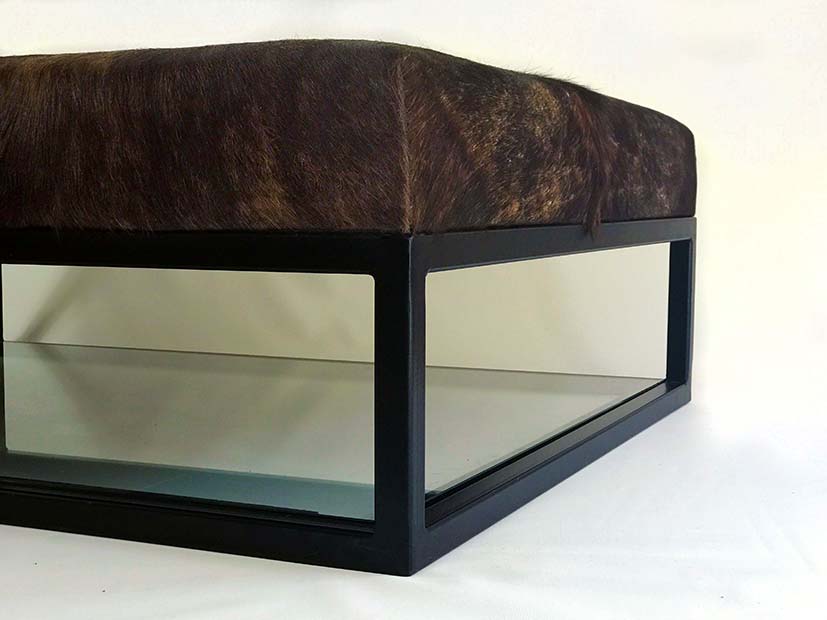 metal footstool with cowhide upholstery cover