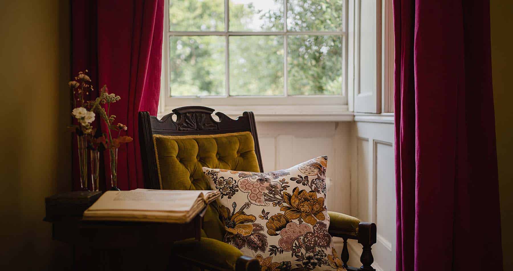 handmade cushion on velvet chair